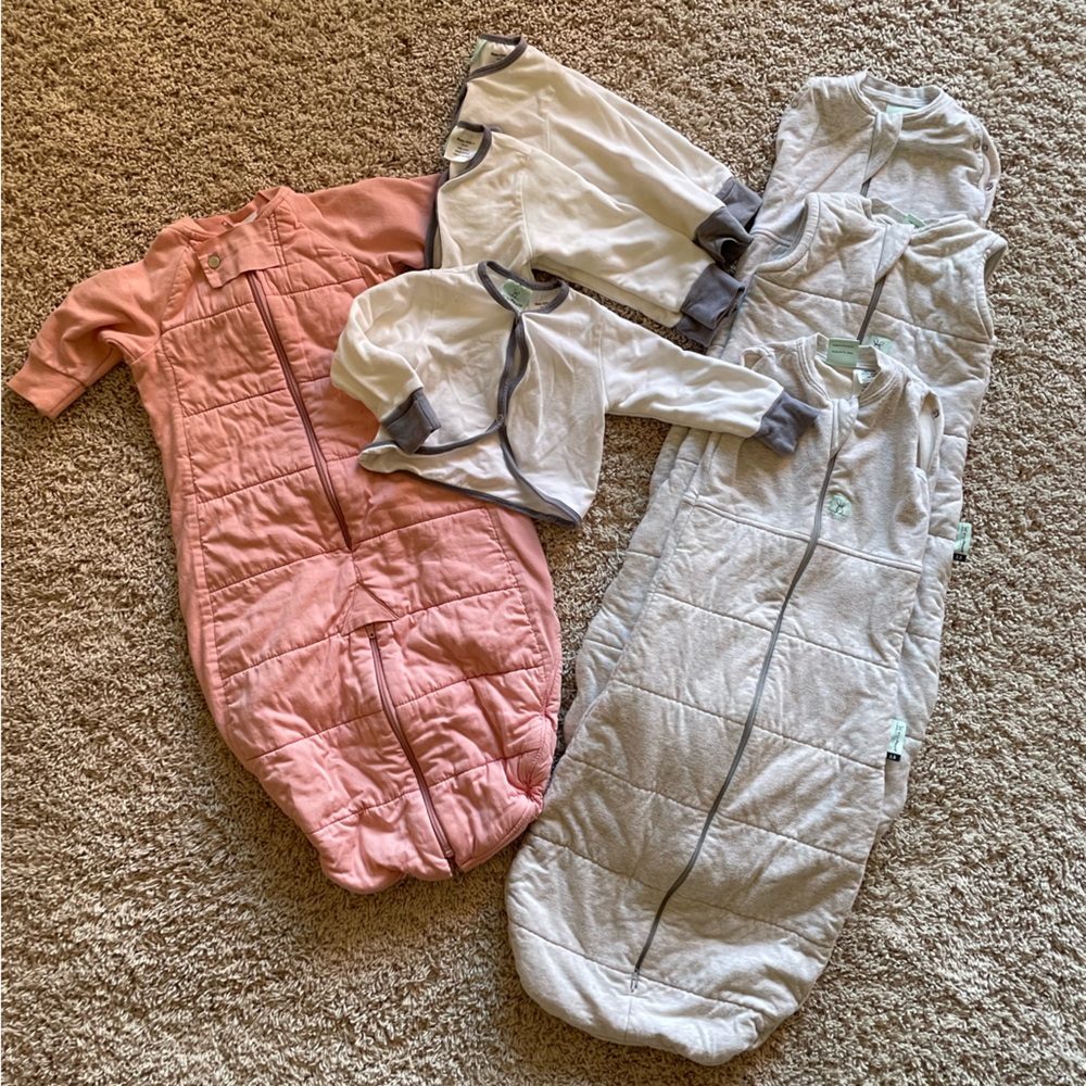 3 sleep sacks, 1 sleep sack with open leg option (zipper), 3 arm warmers.